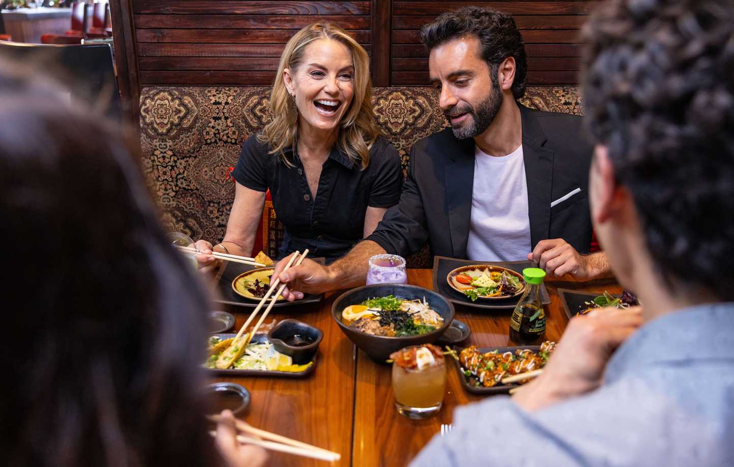 Friends enjoying a meal at Loft 94 in Jamul Casino Resort, San Diego.